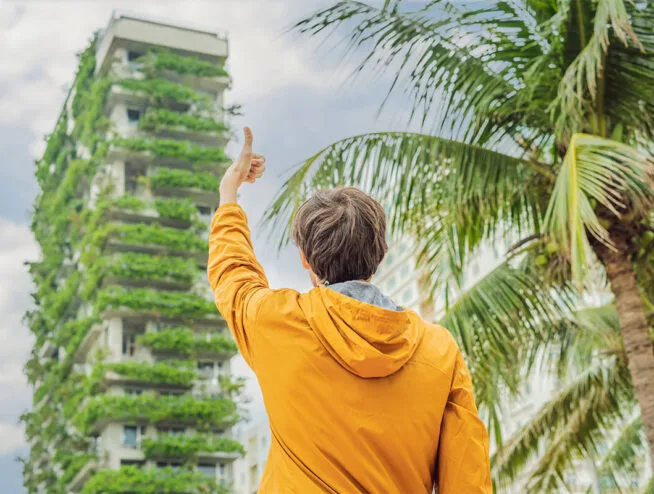London builders and electricians celebrating sustainable construction with a green vertical garden building
