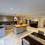 London builders and electricians completed open‑plan kitchen and dining renovation with modern island and dining area.